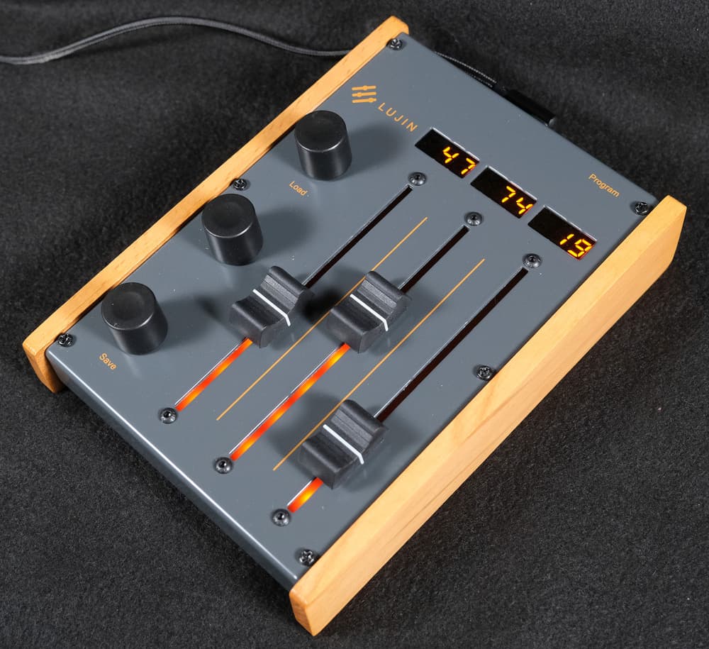 The Lujin MIDI controller, showing its three faders, three rotary knobs, and value displays